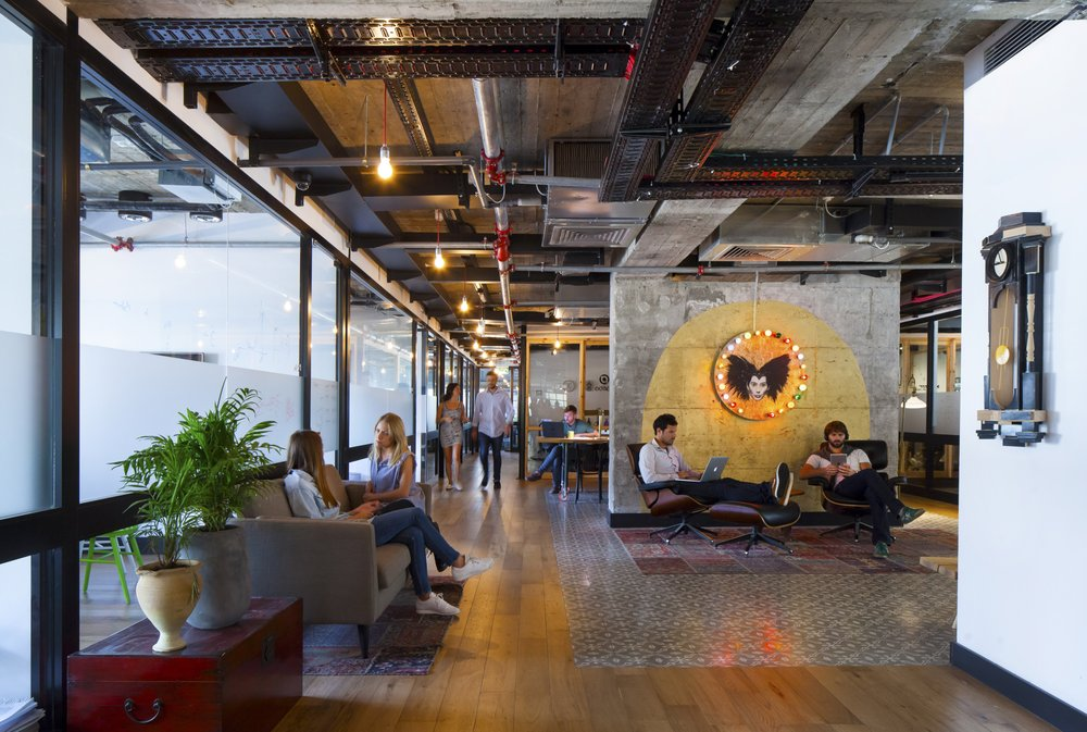 Sunlit corridor with quiet workspaces